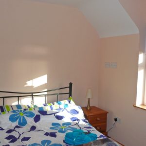 Heron Water Cottage, Bedroom 1. Both Bedrooms upstairs. Rent an Irish Holiday Home with Sea View along the Wild Atlantic Way in Kerry, Rent a Cottage with Seaview in Ireland along the Ring of Kerry.