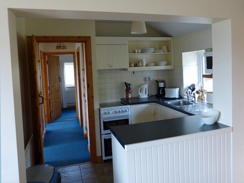 Holiday Home, Kerry, Ireland, Derrynane Haven 07, Kitchen with Passage to the other Rooms, Rent an Irish Cottage with Sea View along the Wild Atlantic Way in Kerry