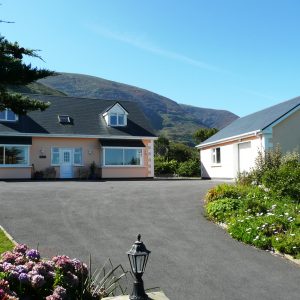 Taobh na Greine, Front Elevation. Rent an Irish Cottage with Sea View along the Wild Atlantic Way in Kerry from www.fir-darrig.net. Rent a Holiday Home with Seaview in Ireland along the Ring of Kerry.