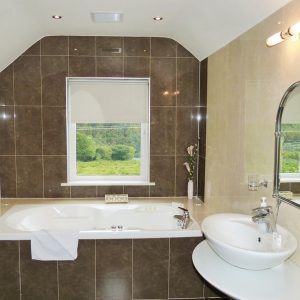 Bath Room to Bedroom three on the first Floor of Holiday Home Castle View in Glenbeigh, County Kerry, Ireland.